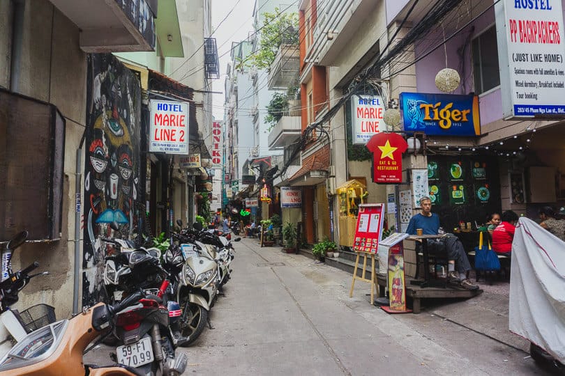 Looking for things to buy in shops down alleyways in Vietnam.